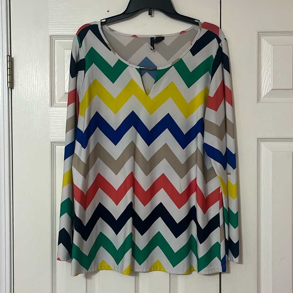 Long sleeve that can be buttoned to a 3 quarter length